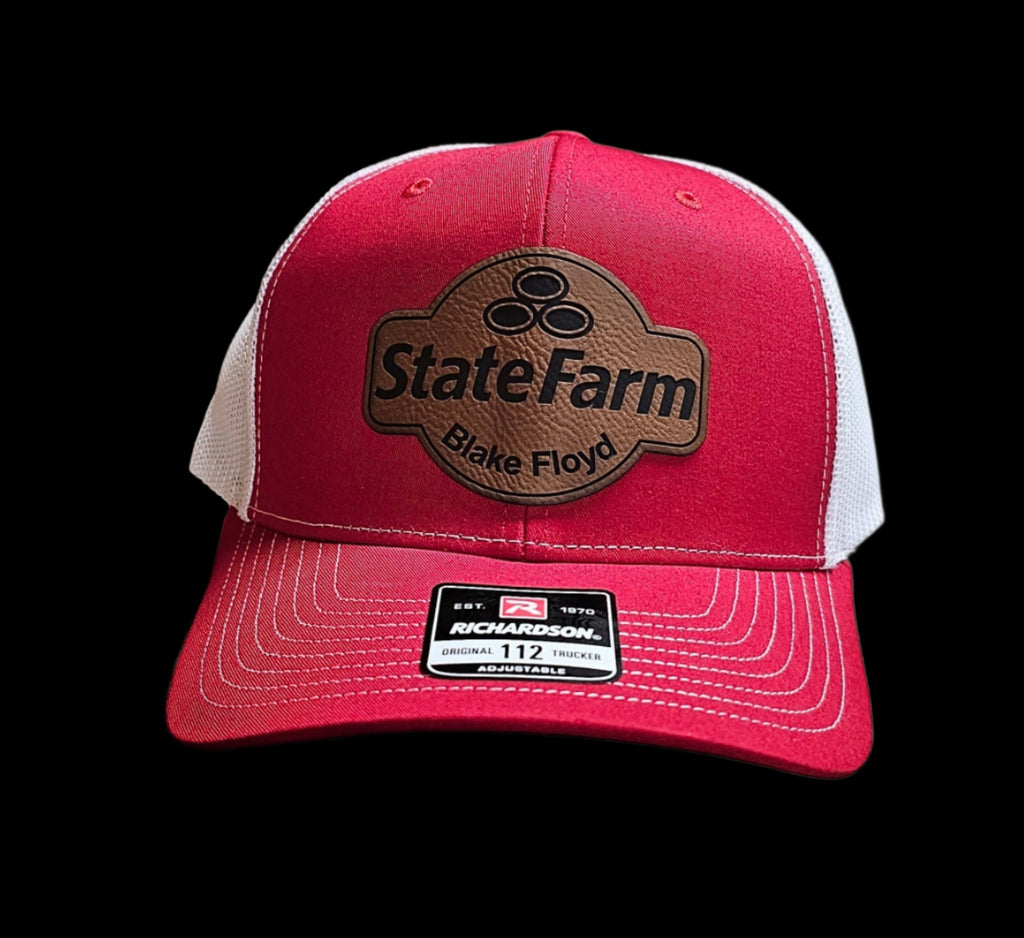 custom patch on red and white cap