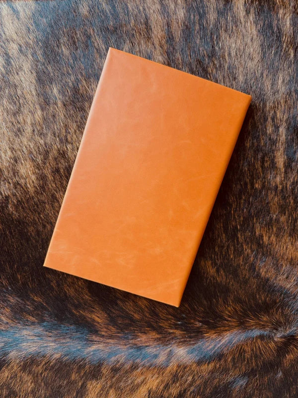 orange leatherette journal